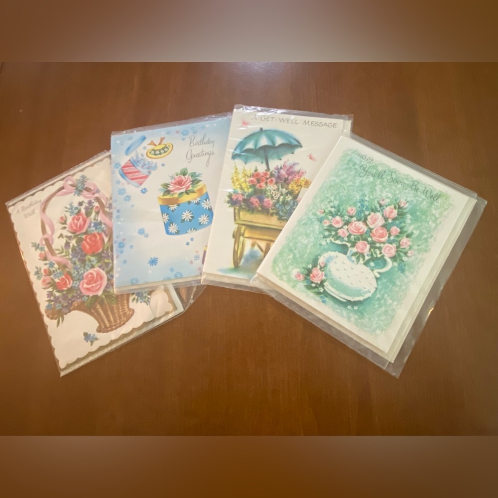Set of 4 vintage greeting cards with envelopes and protective coverings